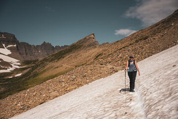 Woman treks across snowfield
