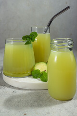 Jus kedondong. Ambarella or jew plum or kedondong juice in glass.