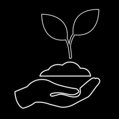 Hand holding soil with small trees on top is a vector illustration
