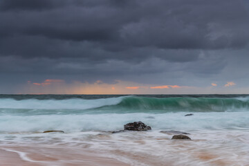 A moody overcast sunrise seascape