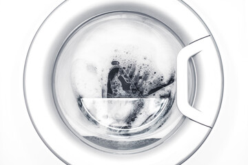 washing clothes in a washing machine