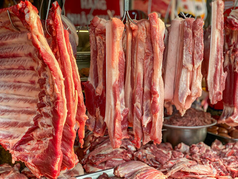 Uncooked pork belly and pork ribs at red meat market