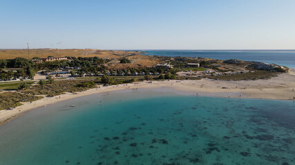 Paradise deserted turquoise bay beach close to town aerial