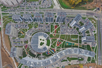 Photo from drone flying over multistorey buildings top view