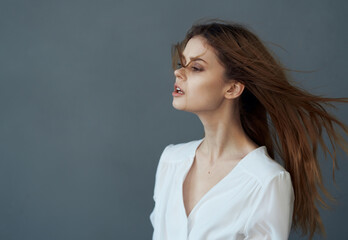 elegant woman in white dress luxury studio gray background