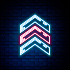 Obraz premium Glowing neon line Military rank icon isolated on brick wall background. Military badge sign. Colorful outline concept. Vector