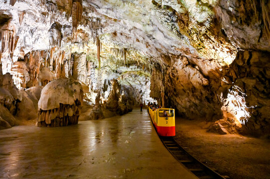 Underground tourist train in Postojna cave, Slovenia. It is the second-longest cave system in the country.