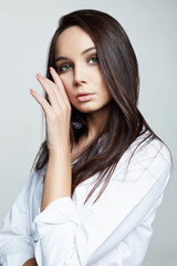 fashion beauty portrait of beautiful woman in white shirt