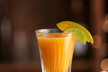 Glass of tasty mango margarita, closeup