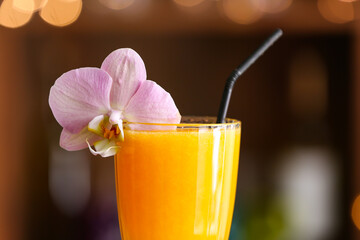 Glass of tasty mango margarita, closeup