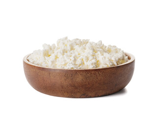 Bowl with cottage cheese on white background