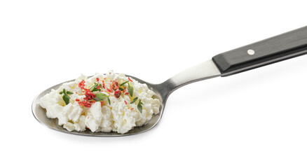 Spoon with cottage cheese on white background