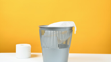 Throw out the toilet paper in the trash can