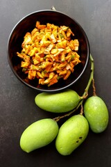Green mango salad. Raw mango instant pickle. also known as kairichi koshimbir in Marathi. copy...
