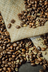  Coffee beans on a sackcloth. Coffee background.