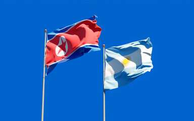 Flags of North Korea and Argentina.