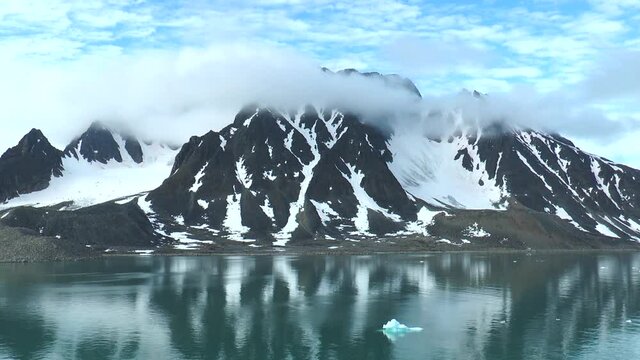 Arctic landscape. Mountains and Glaciers of the Svalbard archipelago. View from the cruise ship.