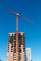 Fototapeta na wymiar Construction of a multi-storey high-rise apartment building