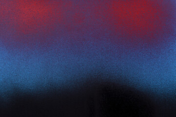 black and red spray paint on a blue colored paper background