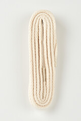Shoe laces on a white background.