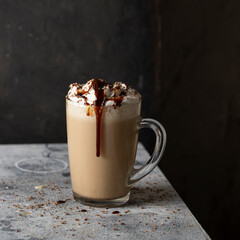 Coffee latte, coffee drink made with espresso and steamed milk and decorated with chocolate. delicious drink