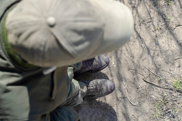 Overhead view of a man in military uniform.