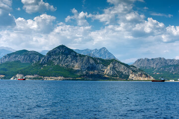 vessel for transportation of containers at the anchorage near the sea shore