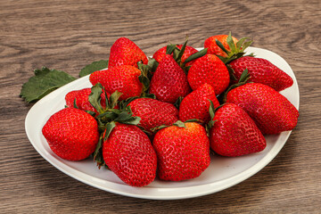 Ripe sweet strawberry with leaf