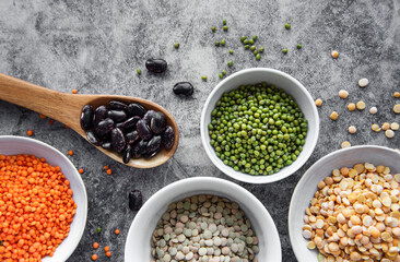 Bowls with different types of legumes