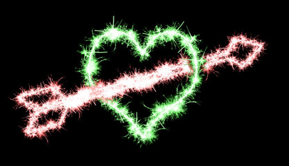 Heart and arrow made of sparks