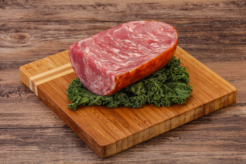 Beef ham piece over board