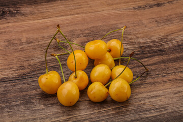 Sweet ripe yellow cherry heap