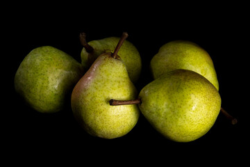 Pears in the dark. Still life low-key picture taken in studio using light painting technique.
