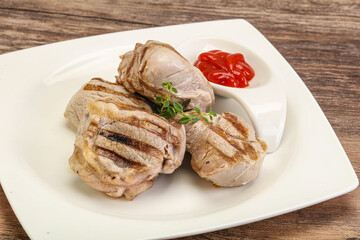 Grilled pork tenderlion with tomato sauce