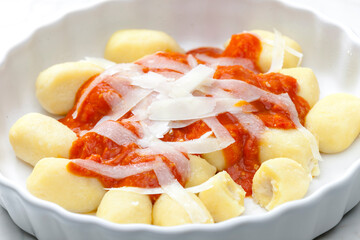 gnocchi with tomato sauce and parmesan cheese