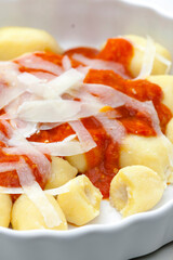 gnocchi with tomato sauce and parmesan cheese
