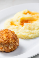 meat ball with cheese served with mashed potatoes