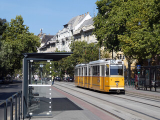 Fototapeta na wymiar Budapest,Hungary, 15th September 2019 - Yellow tram number 47 and station