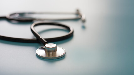 Black stethoscope, health care concept.
