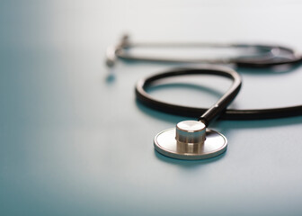 Black stethoscope, health care concept.