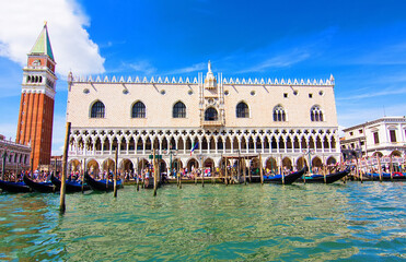 Beautiful old Doge's palace and Campanile of Saint Mark's Cathedral on Piazza di San Marco, view from the the Grand Canale in Venice, Italy. Italian buildings cityscape. Soft focus