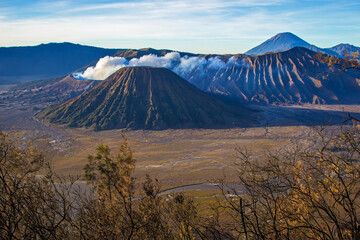 Naklejka premium Beautiful early morning at Bromo Tengger Semeru National Park on East Java, Indonesia. Aerial view of volcano Bromo, Mount Semeru and Mount Batok from Penanjakan view point