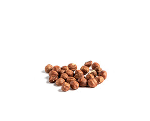Hazelnuts without shell on a white background, isolated. Pile of hazelnut closeup.