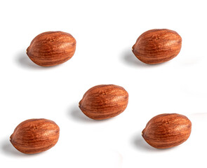 Hazelnuts without shell on a white background, isolated.