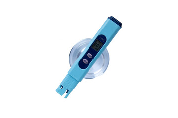 TDS measurement of water. Electronic pH meter in a glass of water.