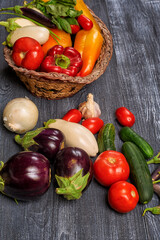 Set of fresh vegetables on a wooden table