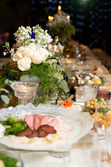 Tables served for special occasion, decorated with flower