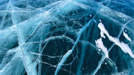 Beautiful amazing unique pattern of frozen Lake Baikal. View from above. Natural landmark of Russia.