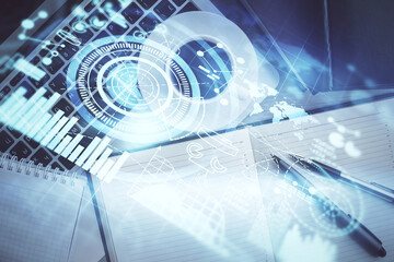 Business theme hologram drawings over computer on the desktop background. Top view. Multi exposure. Concept of international connections.
