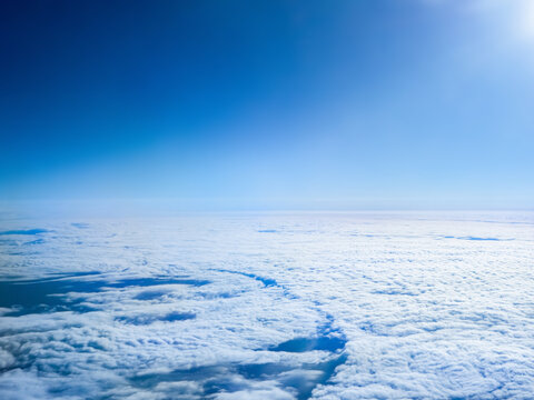 Sea of clouds view from airplane window in tropopause (Japan)